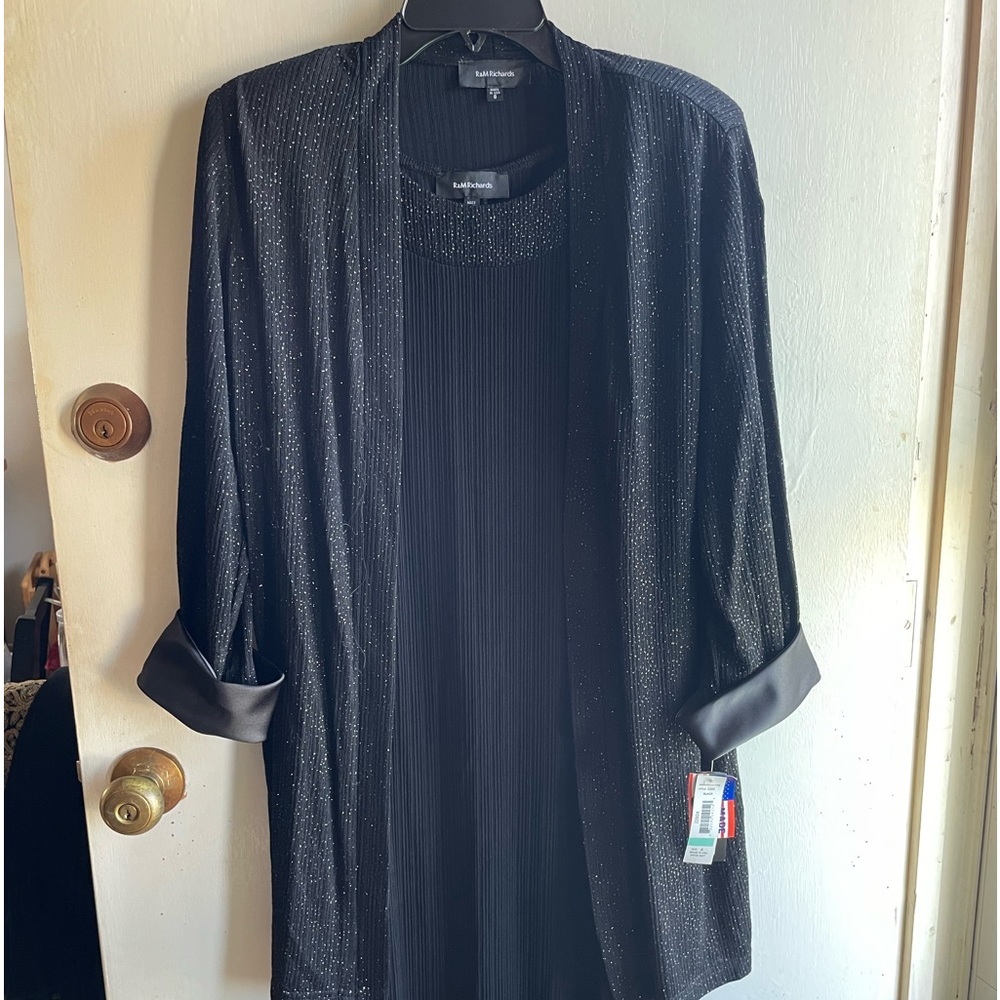Two piece, jacket with sparkles and dress with sparkle neckline detail.